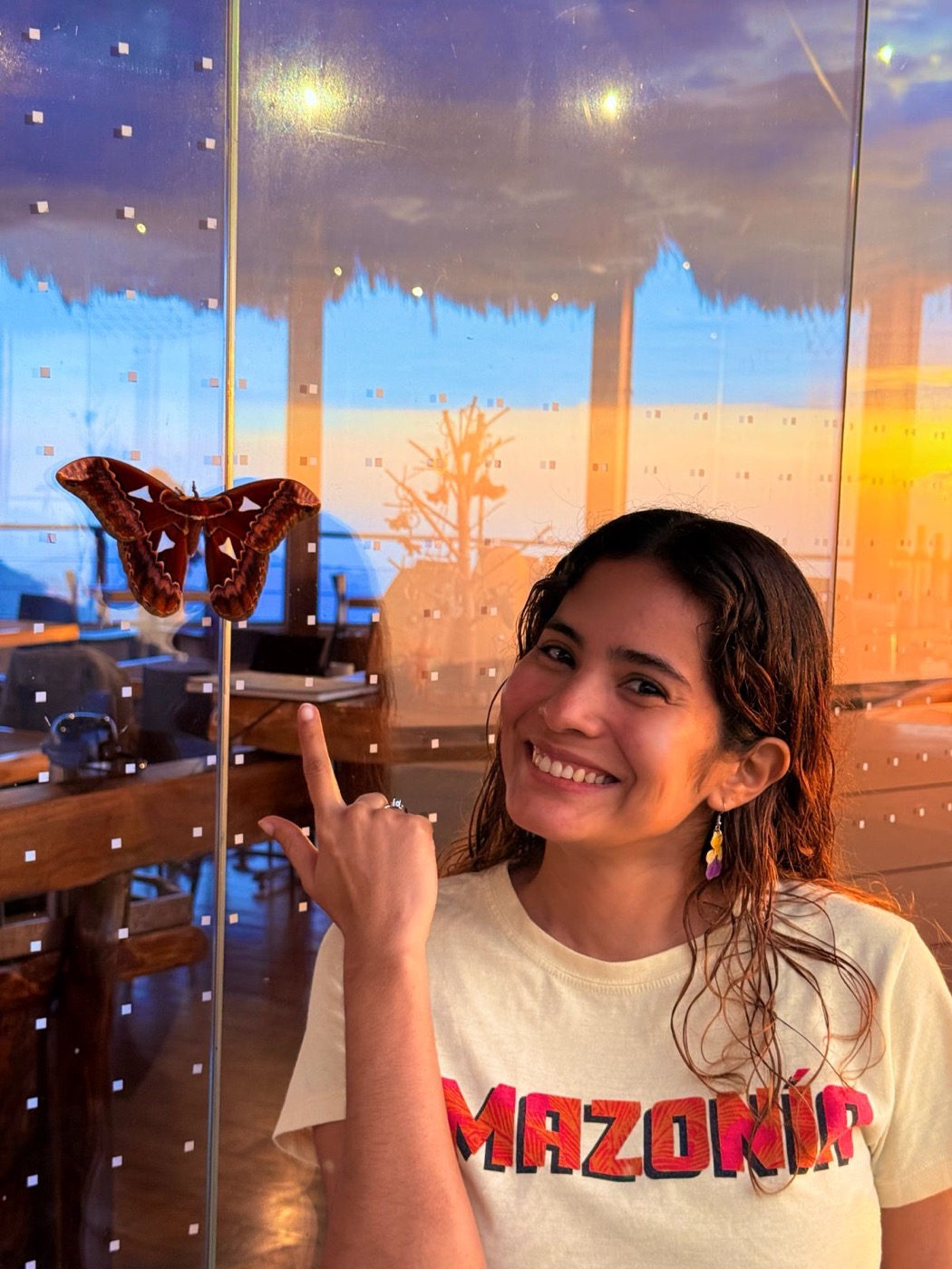 Daniela Ahumada-C. with a moth specimen